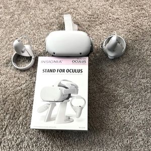 Oculus quest 2 with the stand to hold the controllers and headset